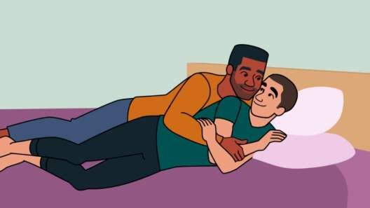 Illustration of two men lying on a bed, cuddling and smiling at each other.