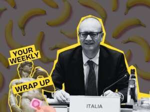 Black-and-white image of a man in a suit seated at a conference table with a nameplate reading “ITALIA,” set against a background patterned with bananas. A “Your Weekly Wrap Up” graphic featuring a classical statue and a condom illustration appears in the bottom left corner.